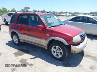 2002 Suzuki Grand Vitara JLX z VIN JS3TD62VX24158467, wystawiony jako IAAI lot #42063744 z przebiegiem 78 998 mil mil oraz . Historia ofert i sprzedaży dostępna na DreamBid. Obrazek 1.