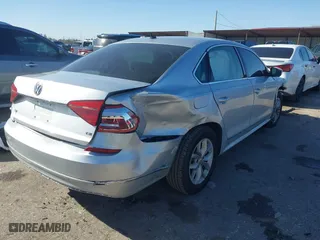 2016 Volkswagen Passat 1.8T S with VIN 1VWAS7A36GC032067, listed as a IAAI auction lot 41207782 with 123,651 mi miles. Bid and sale history available at carsss.com. Image 4.