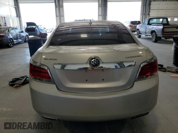 2013 Buick LaCrosse с VIN 1G4GA5E33DF265733, выставлен на аукционе Copart как лот 55846305 с пробегом 162 612 миль миль и Списание • Salvage title. История ставок и продаж доступна на DreamBid. Изображение 6.