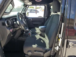 2022 Jeep Wrangler Unlimited Willys with VIN 1C4HJXDN2NW128081, listed as a Copart auction lot 61165615 with 28,525 mi miles and Salvage title. Bid and sale history available at DreamBid. Image 7.