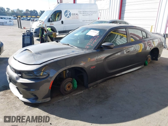 2019 Dodge Charger Scat Pack with VIN 2C3CDXGJ2KH564051, listed as a IAAI auction lot 41255283 with 64,687 mi miles and . Bid and sale history available at DreamBid. Image 18.