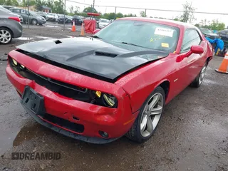 2016 Dodge Challenger R/T Plus z VIN 2C3CDZBT7GH300254, wystawiony jako IAAI lot #42289267 z przebiegiem 103 491 mil mil oraz . Historia ofert i sprzedaży dostępna na DreamBid. Obrazek 2.