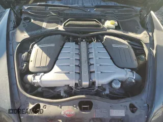 2005 Bentley Continental GT GT z VIN SCBCR63W45C027121, wystawiony jako Copart lot #89028465 z przebiegiem Nie podano mil oraz Czysty tytuł • Clean title. Historia ofert i sprzedaży dostępna na DreamBid. Obrazek 11.