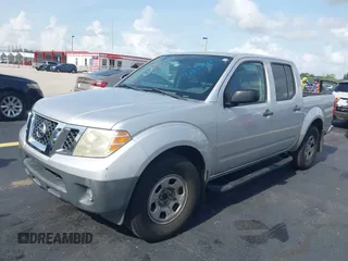 2012 Nissan Frontier SV with VIN 1N6AD0ER5CC404024, listed as a IAAI auction lot 42345633 with 159,970 mi miles and . Bid and sale history available at DreamBid. Image 2.