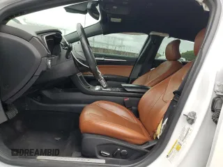 2019 Ford Fusion Titanium with VIN 3FA6P0D94KR184608, listed as a Copart auction lot 48831875 with 124,204 mi miles and Salvage Title. Bid and sale history available at carsss.com. Image 7.
