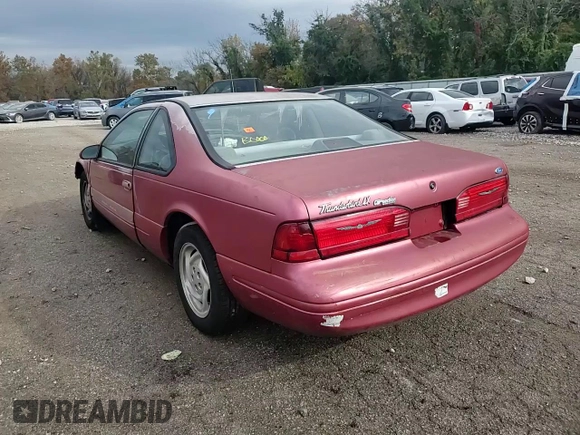 1996 Ford Thunderbird LX z VIN 1FALP62W7TH135632, wystawiony jako Copart lot #77134024 z przebiegiem 128 931 mil mil oraz Szkoda całkowita • Salvage title. Historia ofert i sprzedaży dostępna na DreamBid. Obrazek 11.