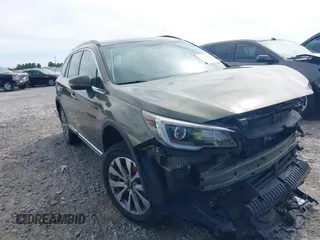 2018 Subaru Outback Touring with VIN 4S4BSATC4J3273162, listed as a IAAI auction lot 42298612 with 78,737 mi miles and . Bid and sale history available at DreamBid. Image 1.