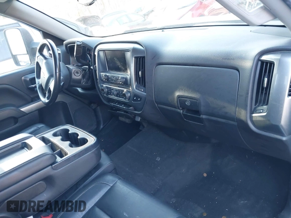 2018 Chevrolet Silverado 1500 LT with VIN 1GCVKREC4JZ379931, listed as a IAAI auction lot 41302638 with 78,242 mi miles and . Bid and sale history available at DreamBid. Image 5.