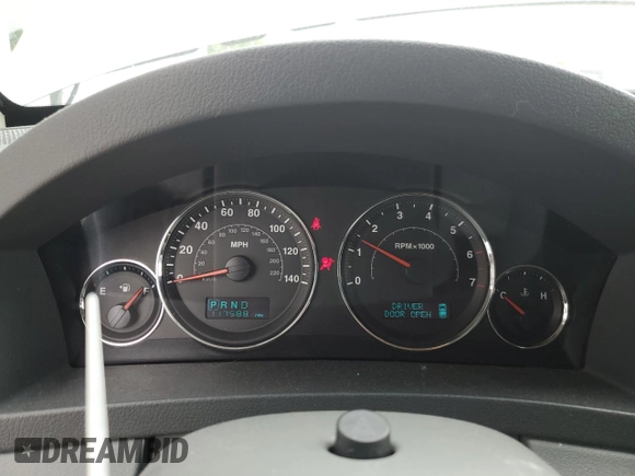 2007 Jeep Grand Cherokee Laredo z VIN 1J8GR48K37C617623, wystawiony jako Copart lot #55875115 z przebiegiem 117 588 mil mil oraz Szkoda całkowita • Salvage title. Historia ofert i sprzedaży dostępna na DreamBid. Obrazek 9.