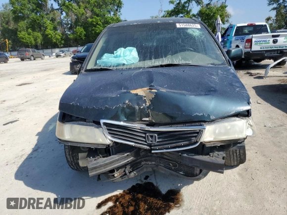 2000 Honda Odyssey EX with VIN 2HKRL1860YH599624, listed as a Copart auction lot 51588625 with Not Provided miles and Salvage Title. Bid and sale history available at DreamBid. Image 5.