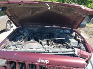 2001 Jeep Cherokee Sport with VIN 1J4FF48S51L516712, listed as a IAAI auction lot 42247399 with 323,576 mi miles and . Bid and sale history available at DreamBid. Image 10.