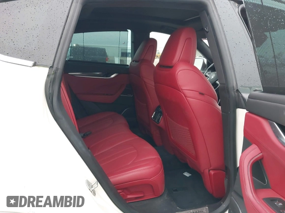 2018 Maserati Levante S GranSport z VIN ZN661YUS5JX301985, wystawiony jako IAAI lot #42180610 z przebiegiem 61 795 mil mil oraz . Historia ofert i sprzedaży dostępna na DreamBid. Obrazek 8.