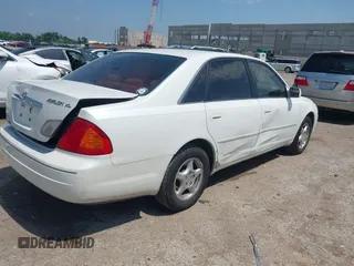 2001 Toyota Avalon XL z VIN 4T1BF28B91U183347, wystawiony jako IAAI lot #42441956 z przebiegiem 310 167 mil mil oraz . Historia ofert i sprzedaży dostępna na DreamBid. Obrazek 4.
