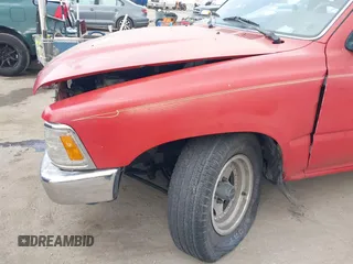 1989 Toyota Pickup DLX with VIN JT4RN93P8K0004371, listed as a IAAI auction lot 42126597 with 180,609 mi miles and . Bid and sale history available at DreamBid. Image 12.