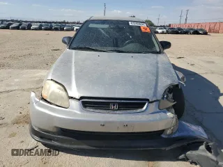 1998 Honda Civic LX z VIN 2HGEJ6576WH566858, wystawiony jako Copart lot #63260834 z przebiegiem 225 031 mil mil oraz Szkoda całkowita • Salvage title. Historia ofert i sprzedaży dostępna na DreamBid. Obrazek 5.