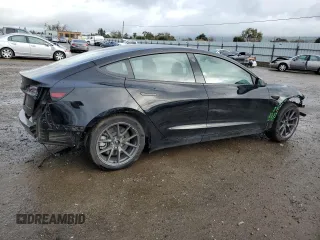 2022 Tesla Model 3 Long Range with VIN 5YJ3E1EB2NF313672, listed as a Copart auction lot 48896025 with 19,936 mi miles and Salvage Title. Bid and sale history available at DreamBid. Image 3.