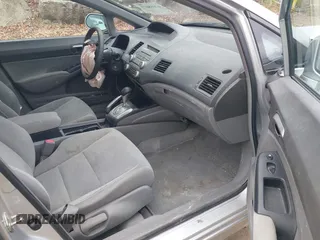 2006 Honda Civic LX with VIN 1HGFA16516L115313, listed as a IAAI auction lot 42018073 with 193,621 mi miles and . Bid and sale history available at DreamBid. Image 5.