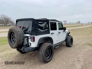 2016 Jeep Wrangler Unlimited Sport with VIN 1C4HJWDG7GL114807, listed as a Copart auction lot 54988515 with 118,651 mi miles and Clean Title. Bid and sale history available at DreamBid. Image 4.