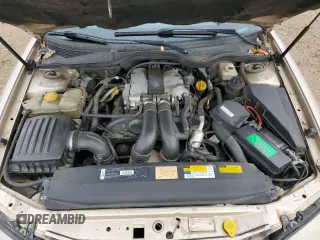 1998 Cadillac Catera z VIN W06VR52R5WR028774, wystawiony jako Copart lot #78085484 z przebiegiem 104 609 mil mil oraz Szkody całkowita. Historia ofert i sprzedaży dostępna na DreamBid. Obrazek 12.
