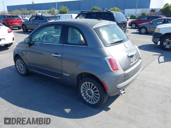 2012 FIAT 500 Lounge z VIN 3C3CFFCRXCT119565, wystawiony jako IAAI lot #42449541 z przebiegiem 93 367 mil mil oraz . Historia ofert i sprzedaży dostępna na DreamBid. Obrazek 3.