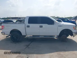 2014 Ford F-150 XL with VIN 1FTFW1EF6EKF36748, listed as a IAAI auction lot 42628725 with 237,190 mi miles and . Bid and sale history available at DreamBid. Image 14.