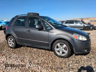 2012 Suzuki SX4 Crossover with VIN JS2YB5A31C6306926, listed as a Copart auction lot 79307604 with 131,762 mi miles and Salvage Title. Bid and sale history available at carsss.com. Image 4.