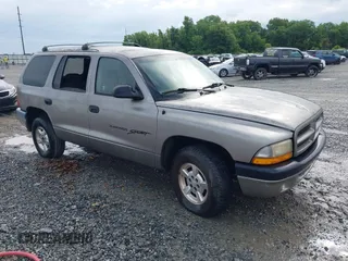 2001 Dodge Durango z VIN 1B4HR28N51F542517, wystawiony jako IAAI lot #42471264 z przebiegiem 145 038 mil mil oraz . Historia ofert i sprzedaży dostępna na DreamBid. Obrazek 1.