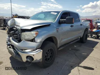 2011 Toyota Tundra with VIN 5TFDY5F1XBX166835, listed as a Copart auction lot 60120885 with 165,514 mi miles and Salvage title. Bid and sale history available at DreamBid. Image 1.