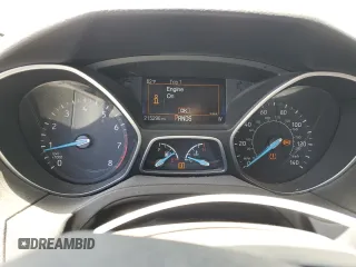 2016 Ford Focus Titanium z VIN 1FADP3J2XGL319399, wystawiony jako Copart lot #59258745 z przebiegiem 215 296 mil mil oraz Szkoda całkowita • Salvage title. Historia ofert i sprzedaży dostępna na DreamBid. Obrazek 9.