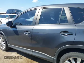 2014 Mazda CX-5 Grand Touring with VIN JM3KE2DY8E0383206, listed as a IAAI auction lot 40205756 with 120,231 mi miles. Bid and sale history available at carsss.com. Image 14.