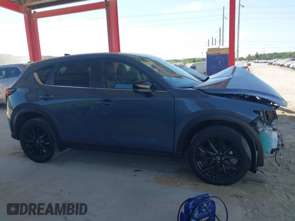 2021 Mazda CX-5 Touring with VIN JM3KFBCM3M0406787, listed as a IAAI auction lot 41800564 with 42,254 mi miles and . Bid and sale history available at carsss.com. Image 14.