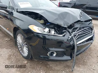 2014 Ford Fusion Titanium with VIN 3FA6P0K9XER364392, listed as a IAAI auction lot 41642439 with 130,302 mi miles and . Bid and sale history available at DreamBid. Image 16.