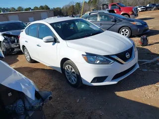 2019 Nissan Sentra S z VIN 3N1AB7AP8KY379747, wystawiony jako IAAI lot #41376492 z przebiegiem 92 328 mil mil oraz . Historia ofert i sprzedaży dostępna na DreamBid. Obrazek 1.
