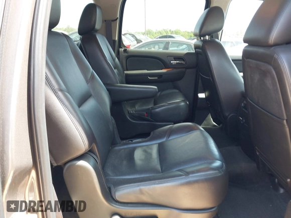 2011 Chevrolet Suburban LTZ with VIN 1GNSKKE3XBR394436, listed as a IAAI auction lot 42324225 with 132,871 mi miles and . Bid and sale history available at DreamBid. Image 8.