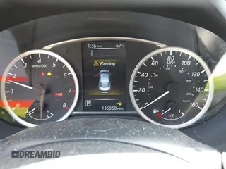 2018 Nissan Sentra S with VIN 3N1AB7AP2JY287421, listed as a IAAI auction lot 42110872 with 136,858 mi miles and . Bid and sale history available at DreamBid. Image 7.
