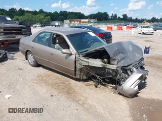 1999 Toyota Camry LE z VIN 4T1BG22K4XU612859, wystawiony jako IAAI lot #42636662 z przebiegiem Nie podano mil oraz . Historia ofert i sprzedaży dostępna na DreamBid. Obrazek 1.