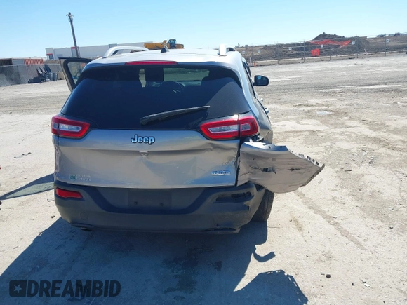 2016 Jeep Cherokee 75th Anniversary with VIN 1C4PJLCB1GW217638, listed as a IAAI auction lot 41689623 with 124,630 mi miles and . Bid and sale history available at DreamBid. Image 6.