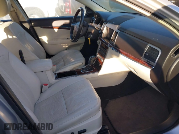 2011 Lincoln MKZ with VIN 3LNHL2GC2BR759690, listed as a IAAI auction lot 41672626 with 117,839 mi miles. Bid and sale history available at carsss.com. Image 5.