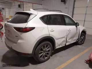 2019 Mazda CX-5 Grand Touring with VIN JM3KFADM7K1563576, listed as a IAAI auction lot 41617026 with NaN miles. Bid and sale history available at carsss.com. Image 4.