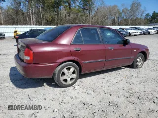 2003 Mazda Protege DX with VIN JM1BJ225030144551, listed as a Copart auction lot 50769905 with 179,876 mi miles and Salvage Title. Bid and sale history available at DreamBid. Image 3.