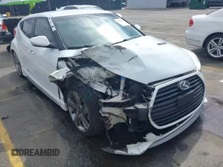 2013 Hyundai Veloster Turbo z VIN KMHTC6AE6DU112233, wystawiony jako IAAI lot #41869164 z przebiegiem 151 091 mil mil oraz . Historia ofert i sprzedaży dostępna na DreamBid. Obrazek 6.