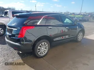 2017 Cadillac XT5 Luxury FWD with VIN 1GYKNBRS5HZ164209, listed as a IAAI auction lot 41213572 with 144,039 mi miles. Bid and sale history available at carsss.com. Image 4.
