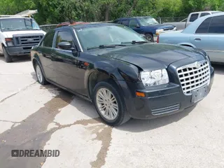 2009 Chrysler 300 LX with VIN 2C3KA43D19H536142, listed as a IAAI auction lot 42025538 with 1 mi miles. Bid and sale history available at carsss.com. Image 1.