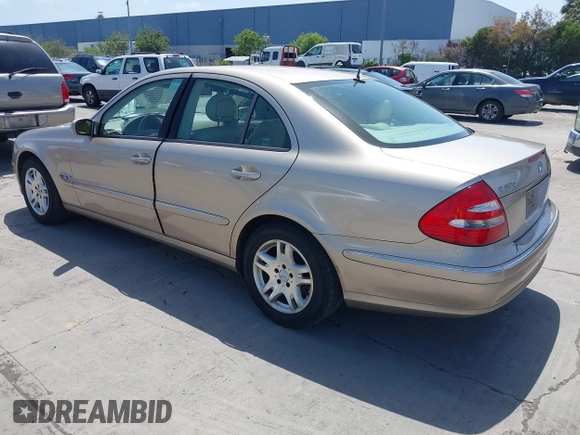 2003 Mercedes-Benz E-Class 3.2L with VIN WDBUF65JX3A236768, listed as a IAAI auction lot 42094824 with 251,896 mi miles. Bid and sale history available at carsss.com. Image 3.