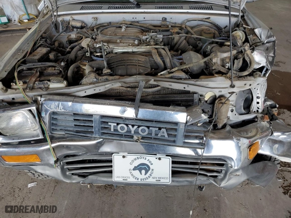 1991 Toyota 4WD Pickups DLX with VIN JT4VN13G0M5055384, listed as a Copart auction lot 65777544 with 180085 miles and Salvage Title. Bid and sale history available at carsss.com. Image 11.