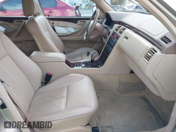 2001 Mercedes-Benz E-Class with VIN WDBJH65J41B349359, listed as a IAAI auction lot 41532318 with 96,375 mi miles. Bid and sale history available at carsss.com. Image 5.