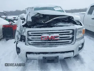 2015 GMC Canyon 4WD SLT with VIN 1GTG6CE36F1257975, listed as a IAAI auction lot 41607688 with 127,523 mi miles. Bid and sale history available at carsss.com. Image 12.