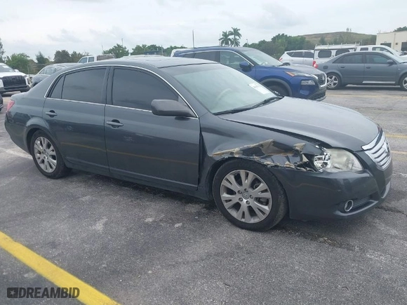 2009 Toyota Avalon XL with VIN 4T1BK36BX9U326676, listed as a IAAI auction lot 40436762 with 137,905 mi miles. Bid and sale history available at carsss.com. Image 1.