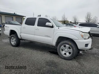 2015 Toyota Tacoma with VIN 3TMLU4EN2FM174431, listed as a Copart auction lot 50756285 with 94,739 mi miles and Salvage title. Bid and sale history available at DreamBid. Image 4.