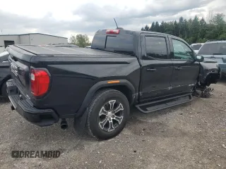 2023 GMC Canyon 4WD AT4 with VIN 1GTP6DEK8P1138775, listed as a Copart auction lot 70655754 with 0 mi miles and Salvage Title. Bid and sale history available at carsss.com. Image 3.